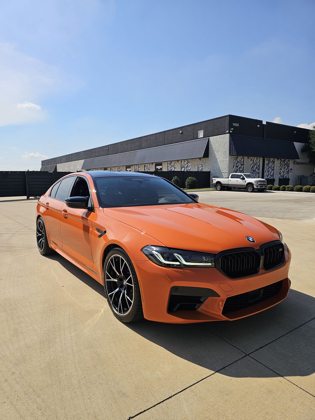 Orange BMW M5 Competition